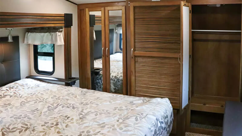Interior view of master bedroom, three wards and a dresser